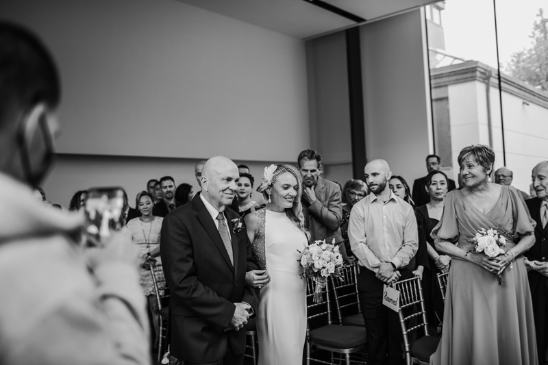 Wedding Photographer, the father of the bride walks his daughter down the aisle