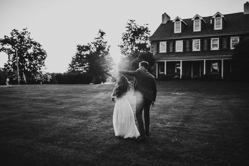 Wedding Photographer, bride and groom dance on estate lawn