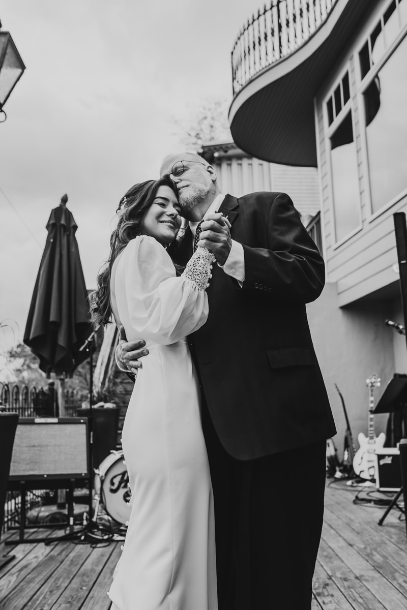 Wedding Photographer, the father of the bride and his daughter dance